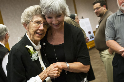 Chris Detrick  |  The Salt Lake Tribune
Sister Stephanie Mongeon hugs Marilyn Peterson during an open house-farewell for the Sisters of St. Benedict at Ogden Regional Medical Center on Tuesday, June 4, 2013. The sisters are returning to St. Benedict's Monastery in St. Joseph, Minn., to continue with their lives of service. "We leave with no regrets," said Sister Stephanie Mongeon. "We leave our peace and gratitude with the people of this community." Sister Mongeon has been serving since 1965.