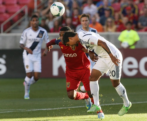 Kim Raff  |  The Salt Lake Tribune
(left) Real Salt Lake forward Robbie Findley (10) and (right) Los Angeles Galaxy defender A.J. DeLaGarza (20) compete for a head ball during a game at Rio Tinto Stadium in Salt Lake City on June 8, 2013.