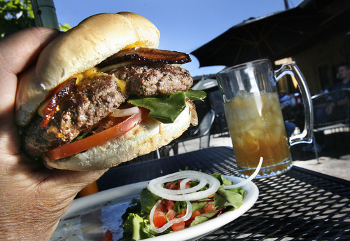 Scott Sommerdorf   |  The Salt Lake Tribune
The bacon-cheeseburger at Lucky 13 on 1300 South just west of Spring Mobile Ballpark. Utah-area readers mentioned Lucky13 as one of their favorite burger places in Salt Lake City, Thursday, June 6, 2013.