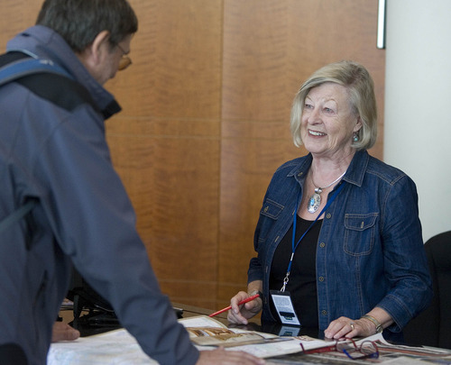 Paul Fraughton  |  Salt Lake Tribune
Christiane Huckin, who is fluent in four different languages, uses her German to give information to a European tourist at the information desk at the Salt Lake County Visitor's Center.