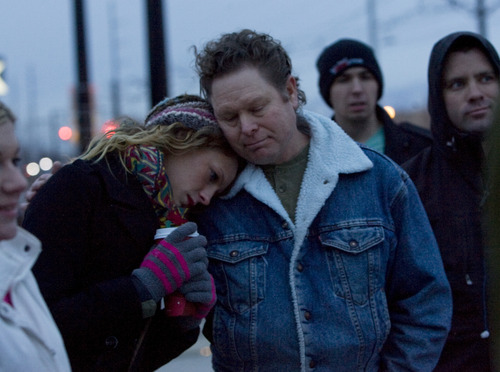 Kim Raff  |  The Salt Lake Tribune
Kayleen Willard is comforted by her father, Fred Willard, as three dozen people gather outside the West Valley City Hall Sunday for a vigil for Danielle Willard, who was shot by West Valley Police on Nov. 2 as she sat in her car unarmed.