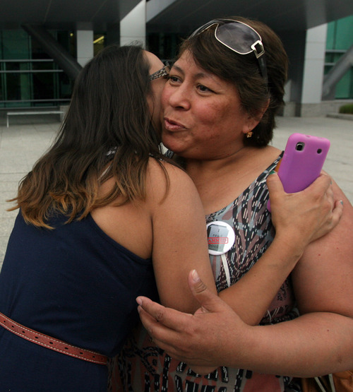 Rick Egan  | The Salt Lake Tribune 

Adriana Rodriguez hugs Jacqueline Hernendez after they called Sen. Orrin Hatch, during a vigil at the federal building, Wednesday, June 12, 2013. Immigrant youth with the Salt Lake Dream Team and community leaders launched a nightly vigil outside Sen. Orrin Hatch's federal building office to push the Senator to champion immigration reform.