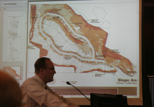 Scott Sommerdorf   |  The Salt Lake Tribune
Todd Draper of Salt Lake County staff outlines the proposal by developer Terry Diehl to rezone his 47 acres at the mouth of Big Cottonwood Canyon from half-acre residential lots to a multipurpose zone that allows higher density and bigger buildings, Wednesday, June 12, 2013.