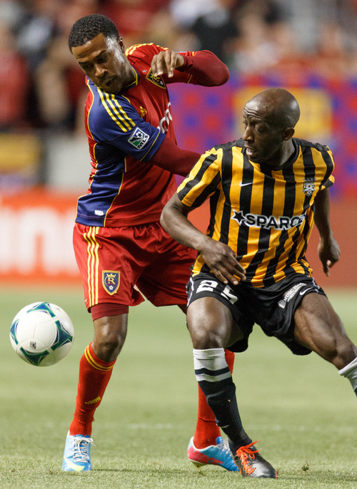 Trent Nelson  |  The Salt Lake Tribune
Real Salt Lake's Robbie Findley and Charleston's John Wilson tangle as Real Salt Lake hosts Charleston Battery in the US Open Cup Wednesday June 12, 2013 at Rio Tinto Stadium in Sandy, Utah.