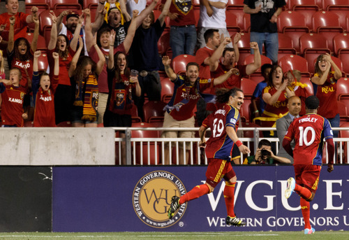 Trent Nelson  |  The Salt Lake Tribune
Real Salt Lake's Devon Sandoval and Javier Morales celebrate Sandoval's goal in the first overtime period as Real Salt Lake hosts Charleston Battery in the US Open Cup Wednesday June 12, 2013 at Rio Tinto Stadium in Sandy, Utah.
