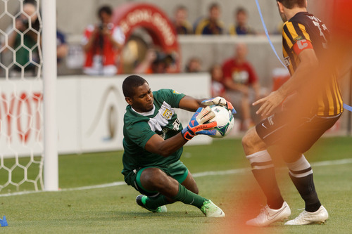 Trent Nelson  |  The Salt Lake Tribune
Charleston goalkeeper Odisnel Cooper makes a save as Real Salt Lake hosts Charleston Battery in the US Open Cup Wednesday June 12, 2013 at Rio Tinto Stadium in Sandy, Utah.
