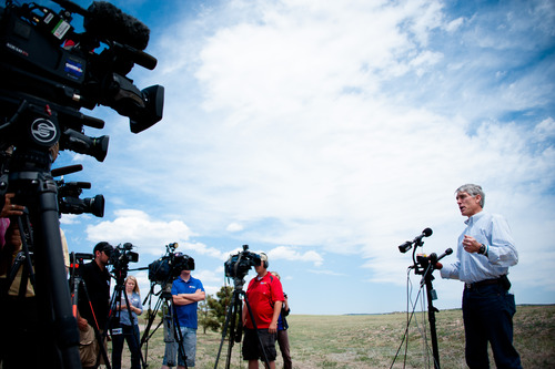 Colorado Senator Mark Udall talks with the media Friday, June 14, 2013 during a news conference, emphasizing his confidence that all federal resources are in place to fight the Black Forest fire and take care of the upcoming restoration efforts, on Friday, June 14, 2013 near Colorado Springs, Colo.  Little more than 36 hours after it started in the Black Forest area northeast of Colorado Springs, the blaze surpassed last June's Waldo Canyon fire as the most destructive in state history. That blaze burned 347 homes and killed two people.  Bradley thinks her home escaped the fire.  (AP Photo/The Gazette, Michael Ciaglo)