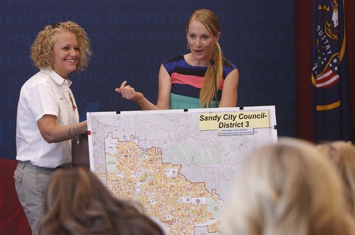 Leah Hogsten  |  The Salt Lake Tribune
Former state Rep. Jackie Biskupski giggles as Lindsay Zizumbo, the state and national program manager at the Hinckley Instiute of Politics, gives her introduction Saturday at the Real Women Run seminar for women who want to run for offic. The event was held at the University of Utah's Hinckley Institute of Politics at Orson Spencer Hall.
