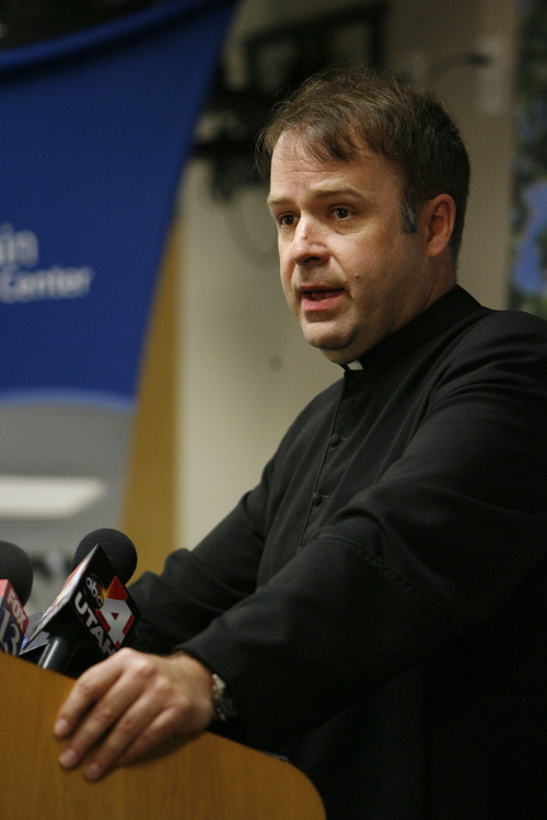 Francisco Kjolseth  |  The Salt Lake Tribune
Family spokesperson, Father Eric Richtsteig talks about the violent events that happened during Mass on Sunday morning where James Evans was shot in the head. Family representatives along with McKay-Dee Hospital doctors and the Ogden Police gave an update on Evans' condition and some of the details from Sunday's shooting on Monday, June 17, 2013.