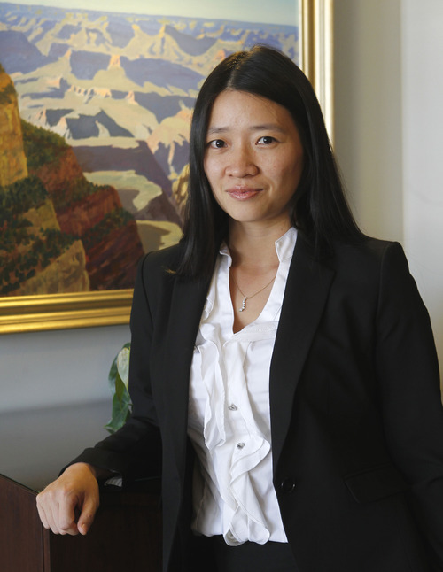 Al Hartmann  |  The Salt Lake Tribune
Amy Hu Sunderland, an immigrant from China who bought her first home at age 10.  Since then, she's grown her real estate investments and become an analyst focusing on consumer trends, splitting her time between Salt Lake City and Hong Kong.
