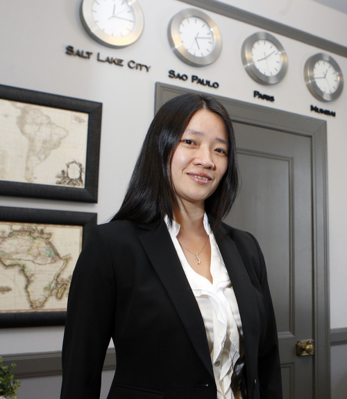 Al Hartmann  |  The Salt Lake Tribune
Amy Hu Sunderland, an immigrant from China who bought her first home at age 10.  Since then, she's grown her real estate investments and become an analyst focusing on consumer trends, splitting her time between Salt Lake City and Hong Kong.