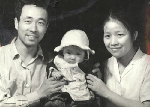 Amy Hu Sunderland as a baby with parents John and Janice Hu in Miluo, China. Courtesy image