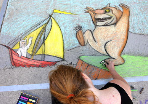 Rick Egan  |  The Salt Lake Tribune 
Kris Hirshbeck works on a chalk drawing Friday, June 14, 2013. More than 140 chalk artists created works of art on the pavement at The Gateway Friday.