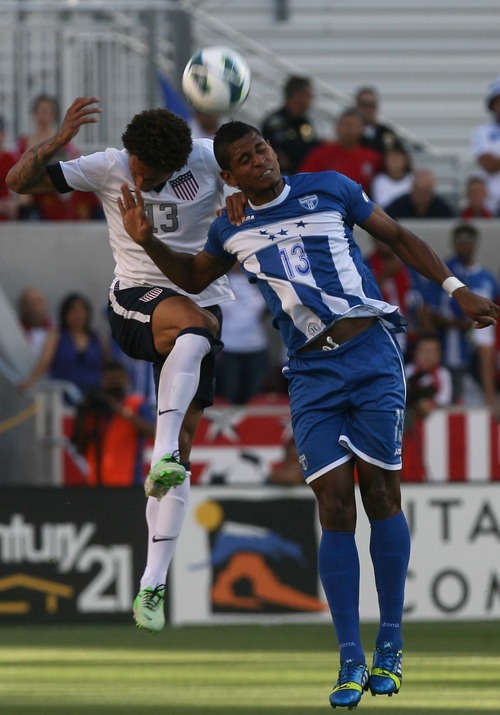 Leah Hogsten  |  The Salt Lake Tribune
Jermaine Jones (13) of the U.S. and Honduras' Carlo Costly (13) fight for possession. USA defeated Honduras 1-0 at the half during their World Cup soccer qualifying rematch Tuesday, June 18, 2013 at Rio Tinto Stadium.