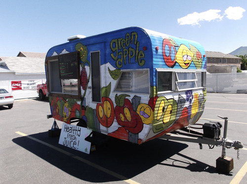 Sean P. Means  |  The Salt Lake Tribune
The Green Apple Juice Co. trailer, parked in the lot of a Sandy business, serves up fresh-squeezed juice drinks.
