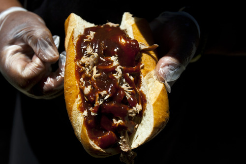 Chris Detrick  |  The Salt Lake Tribune
Tommy T. Brown's pulled pork sandwich at his Q4U barbecue truck Wednesday June 5, 2013.