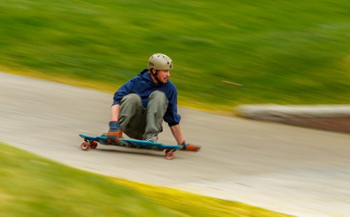 Trent Nelson  |  Tribune file photo
A skateboarder rides through the University of Utah campus in Salt Lake City. A new plan approved Monday would subject skateboarders and bikers to new rules and safety warnings, but wouldn't kick them off campus.