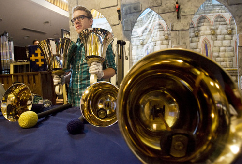 Kim Raff  |  The Salt Lake Tribune
Alec Mittelstadt, a member of  Christ United Methodist Church's Wesley Bell Ringers, rehearses for the last time before going on tour.  This year, the group celebrates its 50th anniversary.