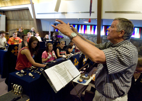 Kim Raff  |  The Salt Lake Tribune
Terry Waite,  director of the  Wesley Bell Ringers, leads the group in a song during their last rehearsal at Christ United Methodist Church in Salt Lake City before their summer tour.  The group celebrates its 50th anniversary this year.