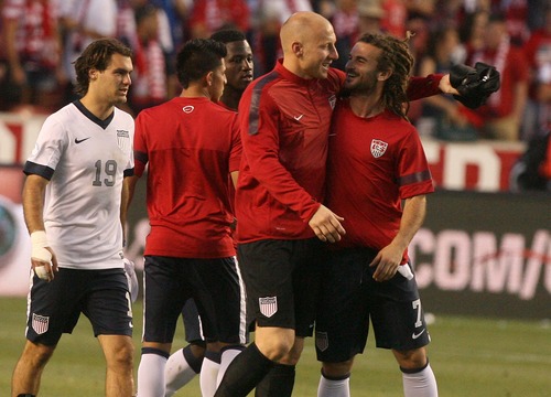 Leah Hogsten  |  The Salt Lake Tribune
Kyle Beckerman (7) and Brad Guzan (12) of the U.S. celebrate the win with his teammates as they walk the field thanking the sold out crowd. USA defeated Honduras 1-0 at the half during their World Cup soccer qualifying rematch Tuesday, June 18, 2013 at Rio Tinto Stadium.