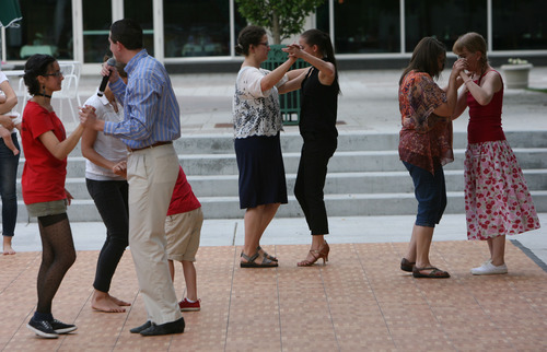 Steve Griffin | The Salt Lake Tribune


Concert goers get a free ballroom dance lesson prior to the Wasatch Jazz Project  free concert at The Gallivan Center in Salt Lake City, Utah Tuesday June 11, 2013.