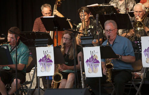 Steve Griffin | The Salt Lake Tribune


Carol Steffens a member of the Wasatch Jazz Project, center, plays the sax during free concert at The Gallivan Center in Salt Lake City, Utah Tuesday June 11, 2013.