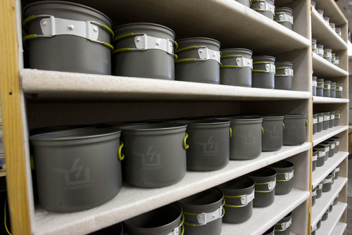 Paul Fraughton  |  The Salt Lake Tribune
Camping pots are lined up ready to be turned into PowerPots.                          
 Tuesday, May 28, 2013