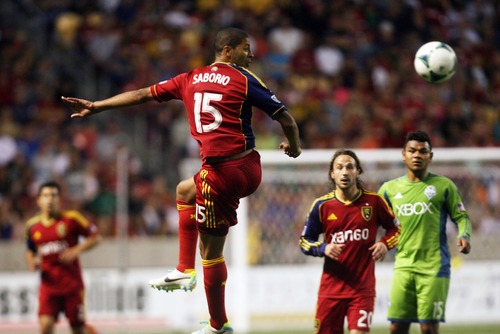 Kim Raff  |  The Salt Lake Tribune
Real Salt Lake forward Alvaro Saborio (15) gets a head on the ball during the second half against the Seattle Sounders FC at Rio Tinto Stadium in Sandy on June 22, 2013. Real went on to win the game 2-0.