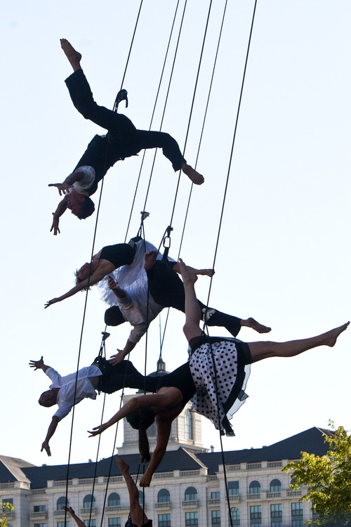 Chris Detrick  |  The Salt Lake Tribune
Vertical dance group Bandaloop members perform during the Utah Arts Festival at Library Square Thursday June 20, 2013.  The festival continues Friday through Sunday, noon to 11 p.m. each day with tickets costing $12 per day; $6 for people 65 and older; free for kids 12 and under.