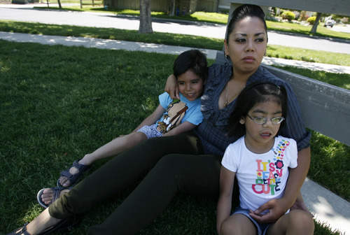 Francisco Kjolseth  |  The Salt Lake Tribune
Maxima Uribe spends time at a park in Eagle Mountain with her kids Karina, 7, and Diego, 6, Aguilar recently. Her family was torn apart when her husband Jose was deported back to Mexico in November of 2010. He faces a 10 year ban on returning while his family faces struggles, including Karina's serious heart condition and medical expenses.