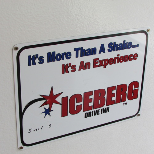 Tom Wharton | The Salt Lake Tribune
A sign promoting the Iceberg Drive-In is located in its small indoor seating area.