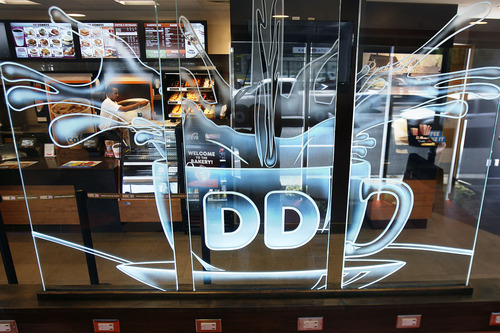 Scott Sommerdorf   |  The Salt Lake Tribune
Employees preparing the restuarant for its opening can be seen in the kitchen through a glass divider at the new Dunkin' Donuts at 217 E. 400 South in Salt Lake City. It is scheduled to open Tuesday, June 25.