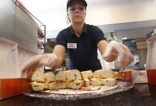 Scott Sommerdorf   |  The Salt Lake Tribune
Lead Manager Bobijo Miranda puts out some breakfast sandwiches that will be given out during a tour of the new Dunkin' Donuts at 217 E. 400 South in Salt Lake City, scheduled to open on Tuesday, June 25th.