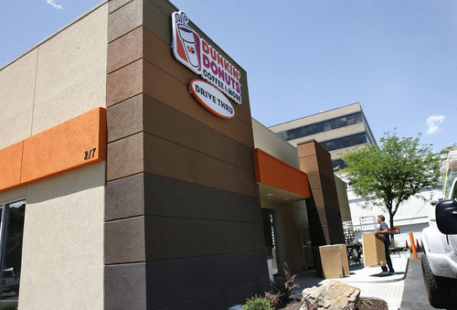 Scott Sommerdorf   |  The Salt Lake Tribune
Display tables and furniture being delivered to the new Dunkin' Donuts on Wednesday, June 19, 2013, which is opening its first Utah store on June 25 at 217 E. 400 South in Salt Lake City.