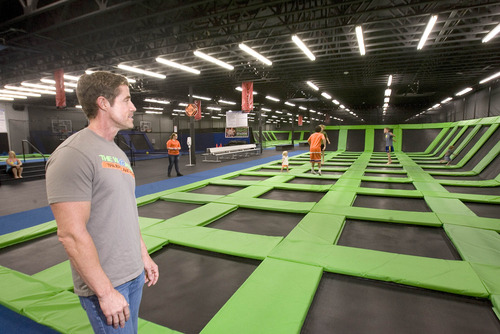 Paul Fraughton  |   The Salt Lake Tribune
Chris Steele, who operates The Wairhouse Trampoline Park, looks over one of the trampoline jumping areas at the indoor facility.
 Tuesday, June 25, 2013