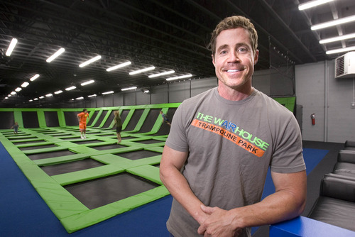 Paul Fraughton  |   The Salt Lake Tribune
Chris Steele, who operates The Wairhouse Trampoline Park, stands in front of one of the trampoline jumping areas at the indoor facility.   Tuesday, June 25, 2013