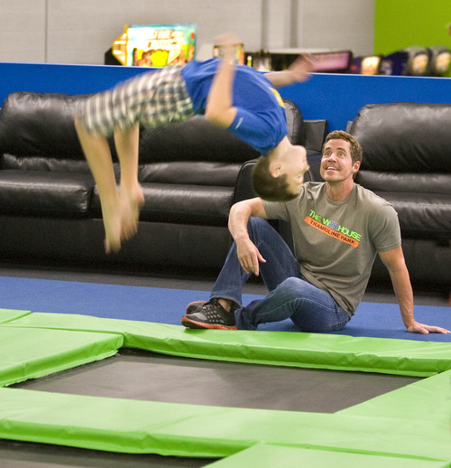 Paul Fraughton  |   The Salt Lake Tribune
Chris Steele, who operates The Wairhouse Trampoline Park, watches as Kyle Greeneisen, who turns 12 in August, does a back flip on one of the trampoline jumping areas at the indoor facility.    Tuesday, June 25, 2013