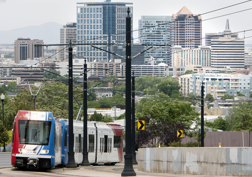 Steve Griffin | The Salt Lake Tribune

A UTA TRAX train climbs out of downtown Salt Lake City as it heads to the University of Utah in Salt Lake City, Utah Monday June 24, 2013. The Salt Lake Chamber and its Utah Transportation Coalition has released a study on the impact of investing in Utah's transportation system.