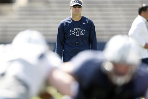 Chris Detrick  |  The Salt Lake Tribune
Brigham Young Cougars head coach Bronco Mendenhall watches during the spring scrimmage at LaVell Edwards Stadium Saturday March 30, 2013.