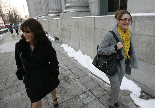 Francisco Kjolseth  |  The Salt Lake Tribune
Twin sisters Valerie, left, and Vicki Darger, both married to Polygamist Joe Darger along with third wife Alina, not pictured, leave Federal court in Salt Lake City following a hearing of arguments in the "Sister Wives" lawsuit challenging Utah's bigamy laws.