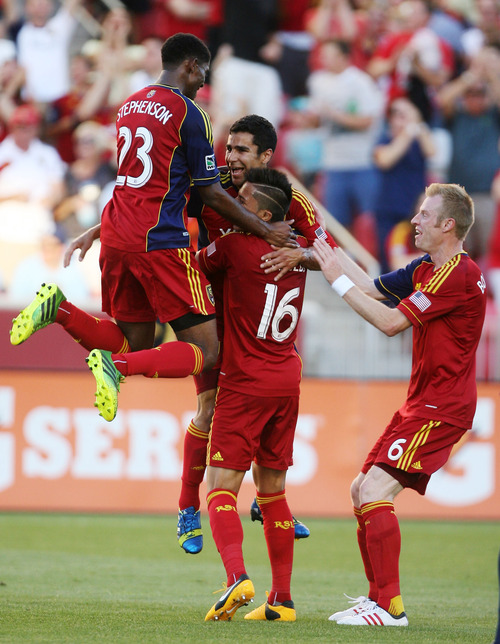 Steve Griffin | The Salt Lake Tribune


RSL players jump on teammate Tony Beltran after he scored the first goal of the game against the Carolina Railhawks in the U.S. Open Cup at Rio TInto Stadium in Sandy, Utah Wednesday June 26, 2013.