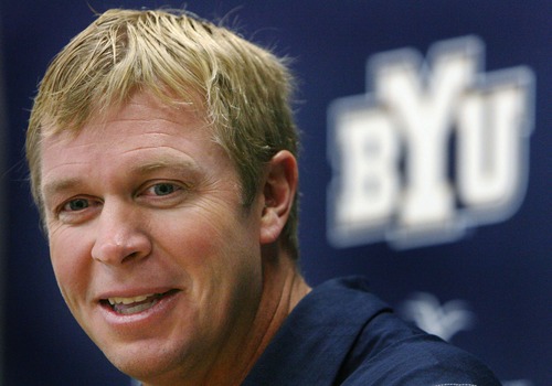 BYU football coach Bronco Mendenhall signed an extension June 26, 2013, through 2016.
