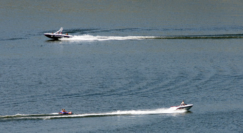 Steve Griffin | The Salt Lake Tribune
Boaters beat the heat as they cruise around Jordanelle Reservoir near Heber on Thursday June 27, 2013.