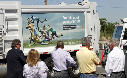 Al Hartmann  |  The Salt Lake Tribune
Forty-three garbage trucks from Wasatch Front Waste will display messages reminding parents to keep their kids alcohol free. They will be displayed on garbage trucks rolling along the Wasatch Front. Messages tell parents to set clear no underage drinking rules.
