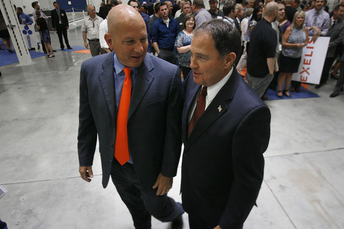 Scott Sommerdorf   |  The Salt Lake Tribune
Mike Blair, V.P. and general manager of Exelis Aerostructures, left, walks with Gov. Gary Herbert after a press conference in which Herbert announced that the administration's goal of creating 100,000 jobs in 1,000 days is on track midway thru the challenge. The private sector has already created 63,600 jobs. In Herbert's 2012 State of the State address, he challenged the private sector to create 100,000 jobs in 1,000 days.