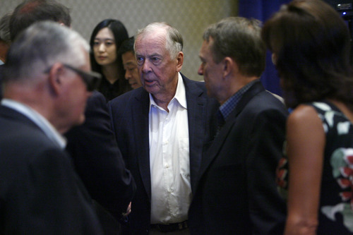 Francisco Kjolseth  |  The Salt Lake Tribune
Billionaire T. Boone Pickens, center, talks to the Western Governors' Association meeting being held at the Montage Deer Valley on Friday, June 28, 2013, about energy and increasing use of natural gas to reduce dependence on OPEC oil.