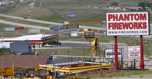 Al Hartmann  |  The Salt Lake Tribune
It's hard to miss the large fireworks sellers just of I-80 on the outskirts of Evanston, Wyoming about a mile before the Utah line.