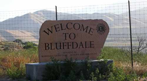 A welcome to Bluffdale sign is shown in front of Utah's NSA Data Center Wednesday, June 12, 2013,in Bluffdale, Utah. The nation's new billion-dollar epicenter for fighting global cyberthreats sits just south of Salt Lake City, tucked away on a National Guard base at the foot of snow-capped mountains. The long, squat buildings span 1.5 million square feet, and are filled with super-powered computers designed to store massive amounts of information gathered secretly from phone calls and emails. (AP Photo/Rick Bowmer)
