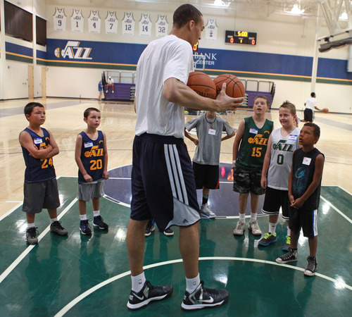 Michael Brandy  |  Special to the Tribune
Rudy Gobert (Utah Jazz center) works with Junior Jazz kids from Farmington, Utah during  a basketball clinic by the Utah Jazz draft picks (Trey Burke, Rudy Gobert and Raul Neto) at Zions Bank Basketball Center.