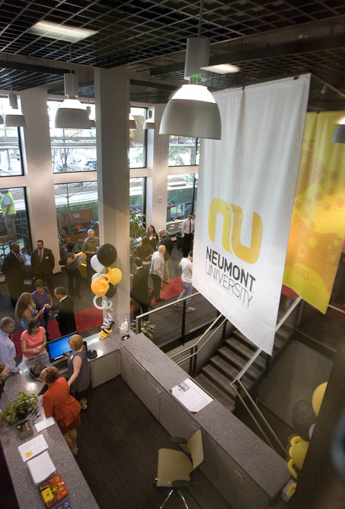 Paul Fraughton  |   The Salt Lake Tribune
Visitors, faculty and students mingle at a reception for the opening of Neumont University at 143 S. Main St. in Salt Lake  City.